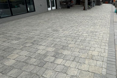 Massive roman paver patio installed in Regina