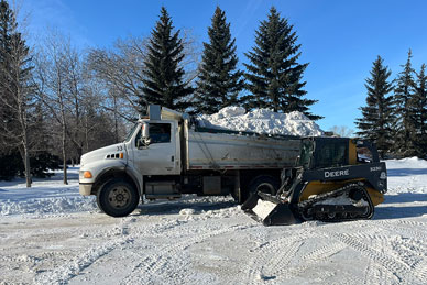 Regina snow removal skidsteer dump truck